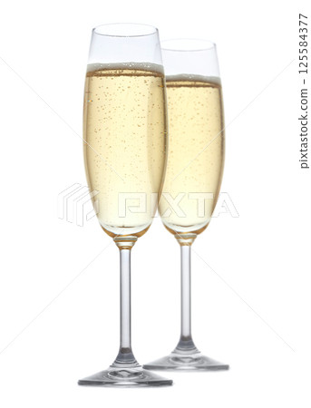 Two glasses of champagne on white 125584377