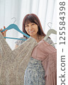 A woman choosing clothes 125584398