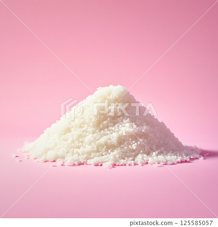 White rice photographed against a pink background 125585057