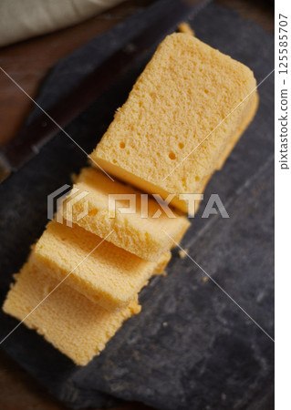 Slices of butter cake on plate 125585707