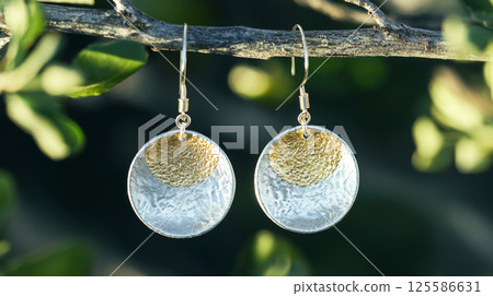 Eco-friendly recycled metal earrings in nature-inspired design for sustainable fashion. eco-conscious jewelry, sustainable style, nature-inspired accessories, environmental awareness, handmade 125586631