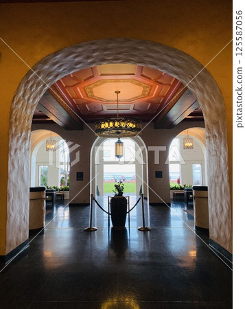 The Hawaii - A snapshot of the lobby of the Royal Hawaiian Hotel with the morning sun gently streaming in 125587056