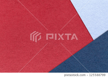 Texture craft dark red color paper background with sky and navy blue border. Vintage abstract wine cardboard. 125588799
