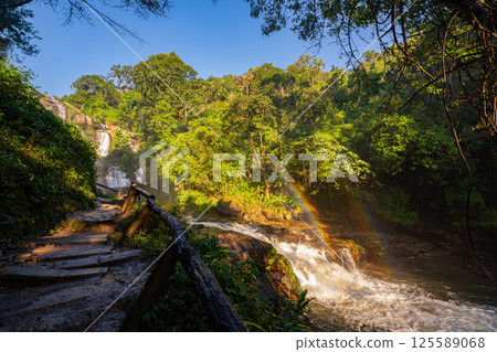 Trail with waterfalls and rainbows at Wachirathan waterfall Chiang Mai 125589068