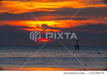 Golden Sunset Over the Ocean Golden Sunset Over the Ocean 125589076