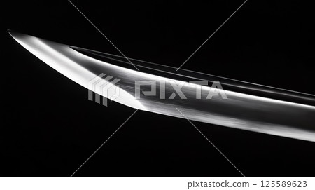 The tip of a Japanese sword. Black background. Metal texture, beautiful ripples 125589623