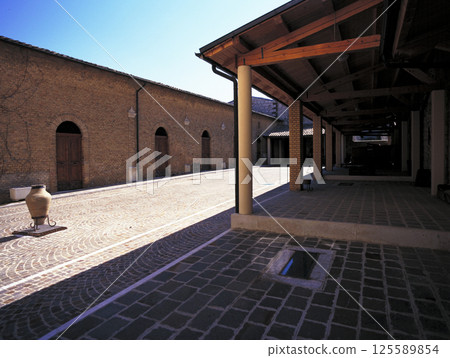 Italy: Old winery and blue sky 125589854