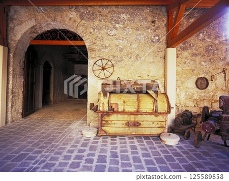 Inside the old winery of a long-established Italian winery Inside the old winery of a long-established Italian winery 125589858