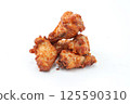 Crispy Golden Chicken Wings Isolated 125590310