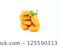 Crispy Chicken Nuggets with Fresh Microgreens 125590313