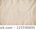 Vintage coffee-stained paper texture with soft wrinkles and aged edges. Perfect for scrapbooking, journaling, invitations, calligraphy, antique projects 125590895