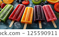 Fruit ice cream popsicle assortment on a purple background. Flat lay with rainbow ice cream on stick line up. Summer refreshing dessert. Vegan sorbet 125590911