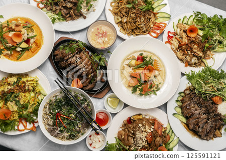 assortment of mixed traditional vietnamese food dishes on buffet table assortment of mixed traditional vietnamese food dishes on buffet table 125591121