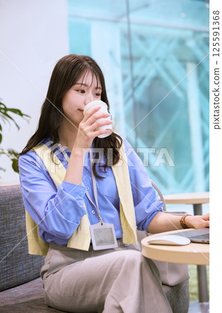 A woman who works in a shared office A woman who works in a shared office 125591368