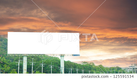 There are large billboards along the roadside. There are large billboards along the roadside. 125591534