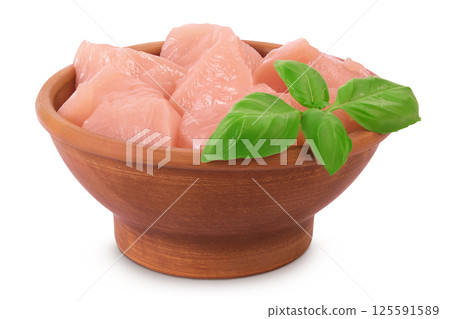 Raw diced chicken fillet in ceramic bowl isolated on white background. Top view. Flat lay Raw diced chicken fillet in ceramic bowl isolated on white background. Top view. Flat lay 125591589