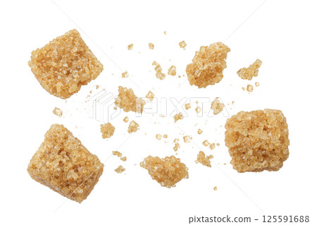 brown sugar cubes isolated on white background. Top view, flat lay brown sugar cubes isolated on white background. Top view, flat lay 125591688
