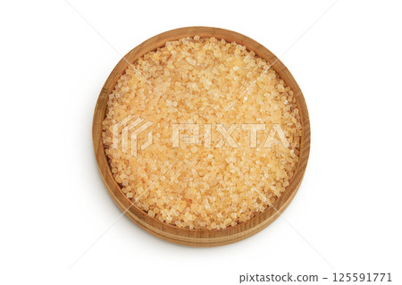 The brown sugar in wooden bowl isolated on white background. Top view. Flat lay 125591771