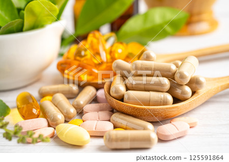 Alternative medicine herbal organic capsule drug herb. Alternative medicine herbal organic capsule drug herb. 125591864