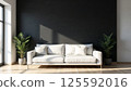 Modern living room interior with white sofa, black wall and indoor plants 125592016