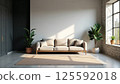 Scandinavian living room with beige sectional sofa and natural light 125592018