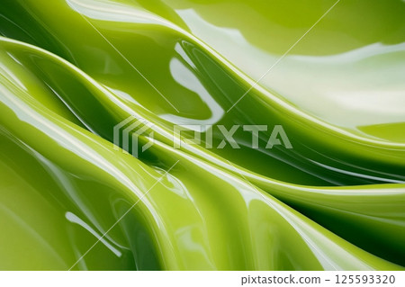 Close-up of glossy Japchae noodles with sauteed vegetables being lifted by chopsticks against a neutral background 125593320