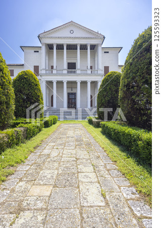 Villa Cornaro in Piombino Dese showing facade and garden with pathway Villa Cornaro in Piombino Dese showing facade and garden with pathway 125593323