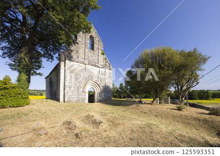 Ancient church standing in Saint Astier, Lot et Garonne, France, during sunny summer day Ancient church standing in Saint Astier, Lot et Garonne, France, during sunny summer day 125593351