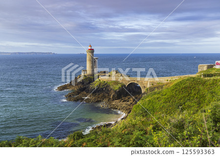 Fort du Minou lighthouse standing on rocky coast of Brittany in France 125593363
