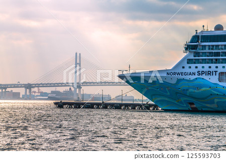 Yokohama cityscape in Japan with two luxury cruise ships, including the Norwegian Spirit and Queen Elizabeth 125593703