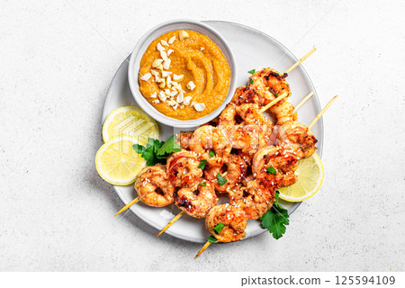 Grilled shrimp prawn satay skewers 125594109