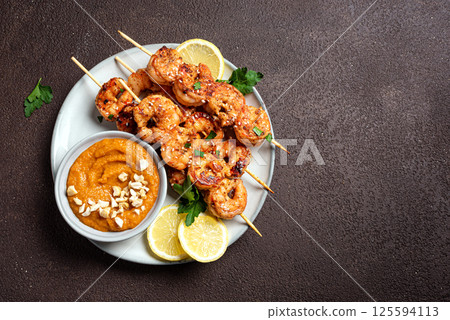 Grilled shrimp prawn satay skewers Grilled shrimp prawn satay skewers 125594113