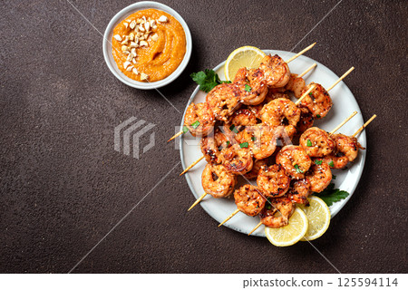 Grilled shrimp prawn satay skewers Grilled shrimp prawn satay skewers 125594114