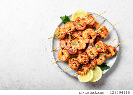 Grilled shrimps skewers 125594116