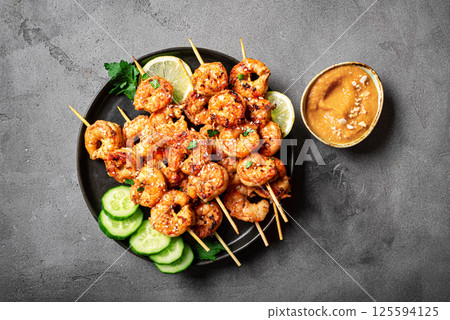 Grilled shimp prawn satay with peanut sauce Grilled shimp prawn satay with peanut sauce 125594125