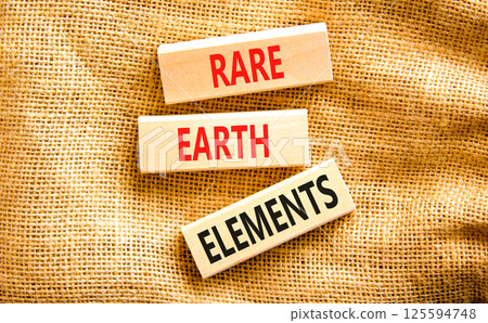 Rare earth elements symbol. Concept words Rare earth elements on beautiful wooden block. Beautiful canvas table canvas background. Business and rare earth elements concept. Copy space. Rare earth elements symbol. Concept words Rare earth elements on beautiful wooden block. Beautiful canvas table canvas background. Business and rare earth elements concept. Copy space. 125594748