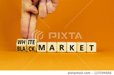 Black or white market symbol. Concept words Black market or White market on beautiful wooden blocks. Beautiful orange background. Businessman hand. Business black or white market concept. Copy space. Black or white market symbol. Concept words Black market or White market on beautiful wooden blocks. Beautiful orange background. Businessman hand. Business black or white market concept. Copy space. 125594888