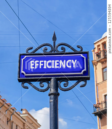 Efficiency symbol. Concept word Efficiency on beautiful blue road sign. Beautiful blue sky and city building background. Business efficiency concept. Copy space. 125594894