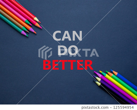 Can do better symbol. Concept words Can do better on beautiful black paper. Colored pencils. Beautiful black background. Business and can do better concept. Copy space. 125594954