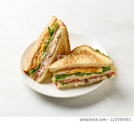 club sandwich on white plate club sandwich on white plate 125595931