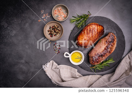 Roasted or grilled duck breast 125596348