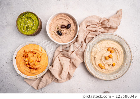 Various hummus dips, healthy and vegan snack 125596349