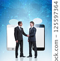 Concept of communication with businessmen handshaking 125597364
