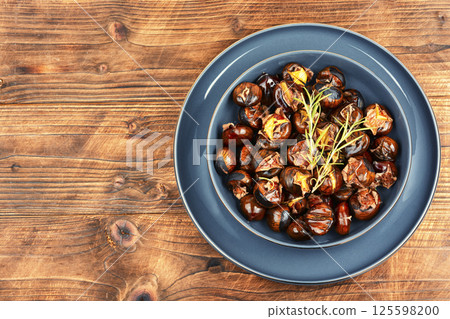 Charred roasted Chestnuts. Charred roasted Chestnuts. 125598200