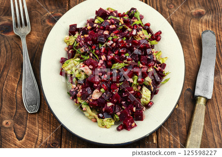 Tasty vegan beetroot and pomegranate salad Tasty vegan beetroot and pomegranate salad 125598227