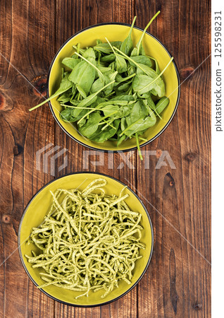 Pasta with spinach. 125598231