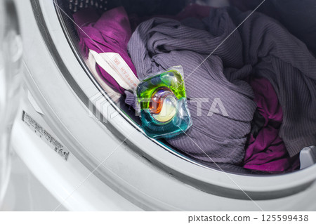 Laundry Detergent Pod Inside Washing Machine Drum Laundry Detergent Pod Inside Washing Machine Drum 125599438