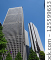 Landscape of the office town looking up at a skyscraper 125599653