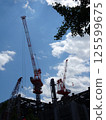 A crane extending in the sky 125599675