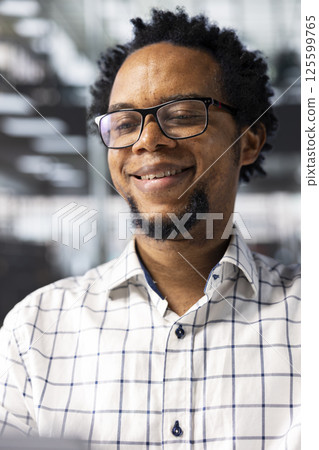 Successful entrepreneur working on financial forecasts at his desk, using data and technology to manage business tasks and project development. Company progresses toward its goals. Close up. Successful entrepreneur working on financial forecasts at his desk, using data and technology to manage business tasks and project development. Company progresses toward its goals. Close up. 125599765